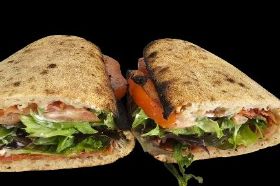 Allergens : Wheat, eggs Hot, Fresh made when you order, Sourdough Panuozzo {The Bread} with Bacon, Lettuce, Mayo, and Tomatoes.